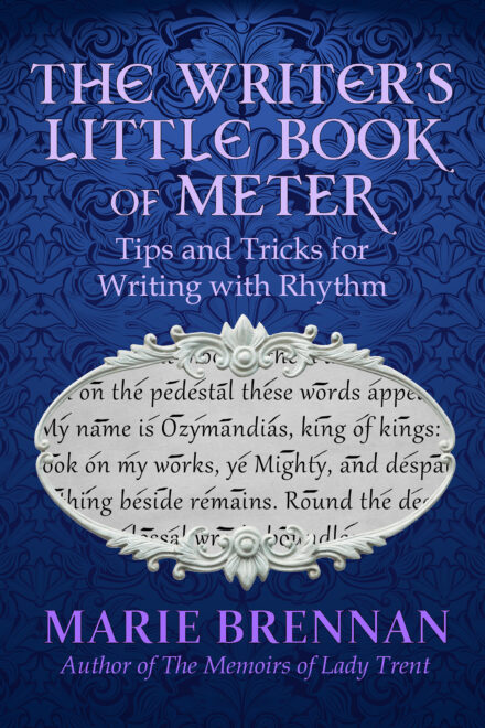 Cover art for THE WRITER'S LITTLE BOOK OF METER: TIPS AND TRICKS FOR WRITING WITH RHYTHM, by Marie Brennan. A blue brocade background with a silver frame enclosing lines from Shelley's "Ozymandias," on which marks have been made to note the meter.